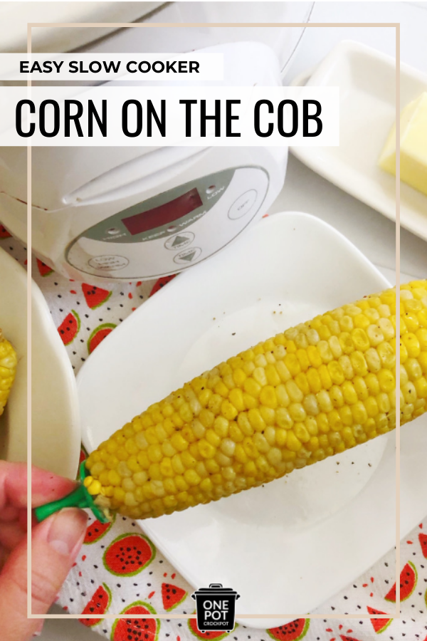 woman holding slow cooker corn on the cob