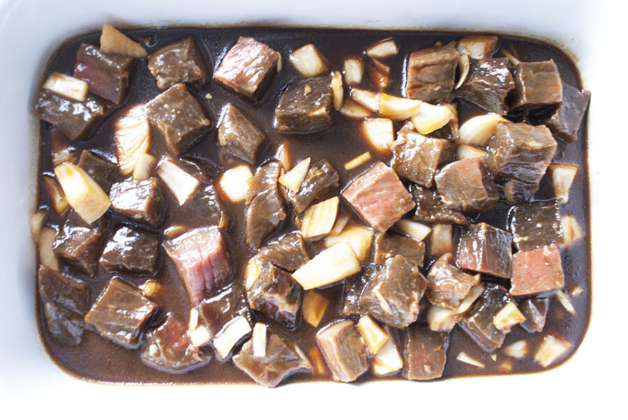 Chunks of beef marinating in Mongolian sauce