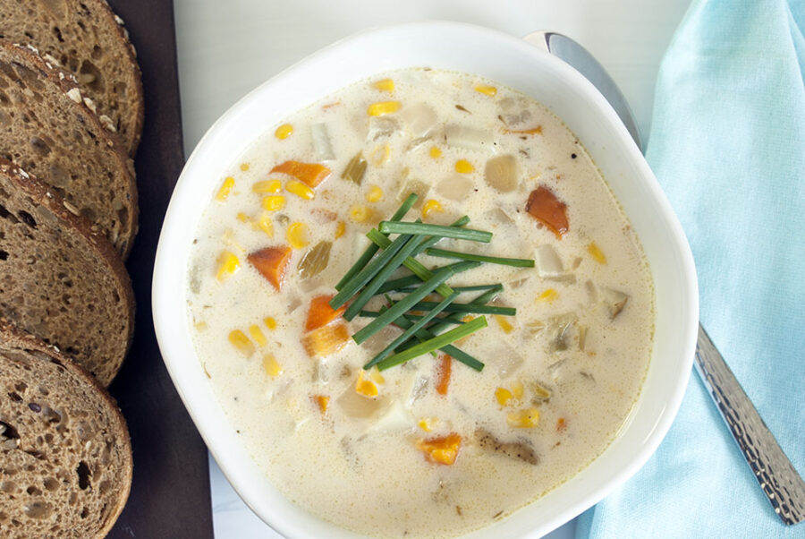 crockpot corn chowder topped off with chives