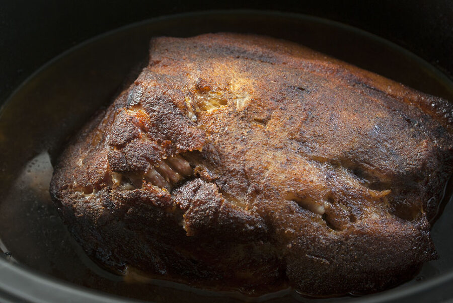 cooked boneless pork butt in the slow cooker 